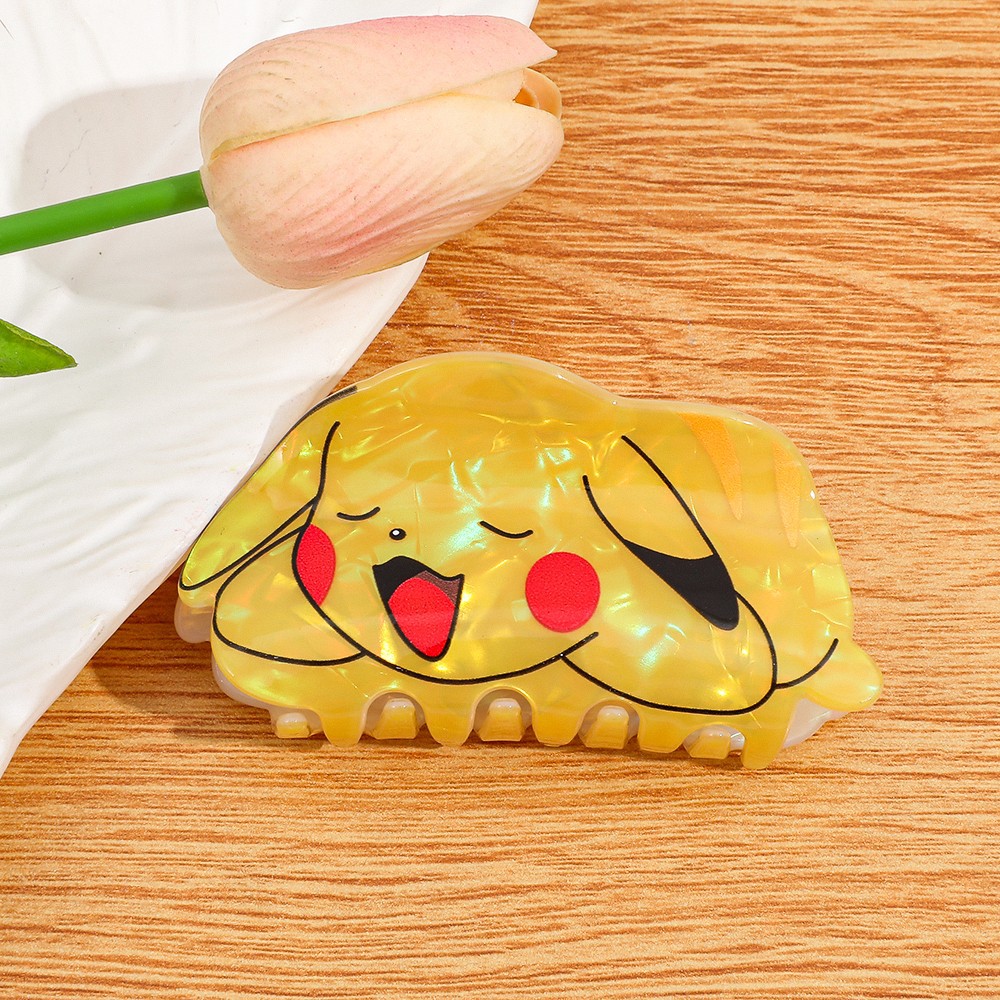 Kreskówkowy klips do włosów Po – Women'S Yellow Accessories recenzja i cena